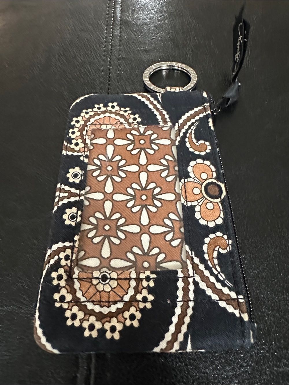 Vera Bradley Zip ID Case featuring a brown and black paisley floral pattern